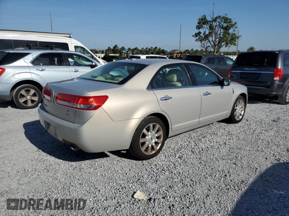 2010 Lincoln MKZ z VIN 3LNHL2GC8AR644901, wystawiony jako Copart lot #56098095 z przebiegiem 165 989 mil mil oraz Nie do naprawy • Non repairable. Historia ofert i sprzedaży dostępna na DreamBid. Obrazek 3.