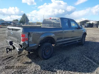 2017 Ford F-150 XL with VIN 1FTFX1EF7HKE42220, listed as a IAAI auction lot 40640809 with 141,073 mi miles. Bid and sale history available at carsss.com. Image 4.