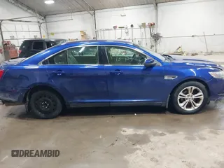 2013 Ford Taurus SEL with VIN 1FAHP2E82DG149828, listed as a IAAI auction lot 41910513 with 130,594 mi miles and . Bid and sale history available at carsss.com. Image 14.