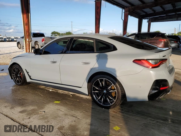 2022 BMW 4 Series M440i xDrive with VIN WBA13AW06NFM38130, listed as a Copart auction lot 82403874 with 49,302 mi miles and Salvage title. Bid and sale history available at DreamBid. Image 2.
