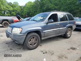 2004 Jeep Grand Cherokee Laredo z VIN 1J4GX48S24C216941, wystawiony jako Copart lot #55584785 z przebiegiem 279 710 mil mil oraz Szkoda całkowita • Salvage title. Historia ofert i sprzedaży dostępna na DreamBid. Obrazek 1.