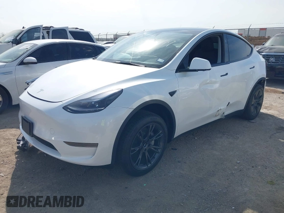 2025 Tesla Model Y Long Range z VIN 7SAYGDED7SA373784, wystawiony jako IAAI lot #41881719 z przebiegiem 1 192 mil mil oraz . Historia ofert i sprzedaży dostępna na DreamBid. Obrazek 21.