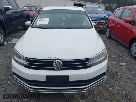 2015 Volkswagen Jetta Sedan 1.8T SE with VIN 3VWD17AJ6FM237674, listed as a IAAI auction lot 41613054 with 71,325 mi miles. Bid and sale history available at carsss.com. Image 12.