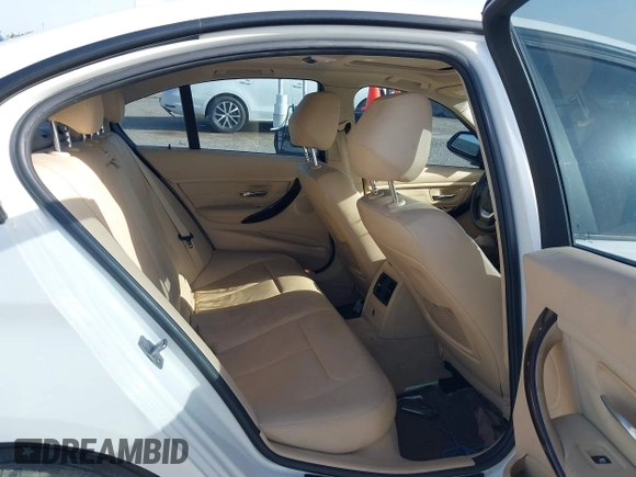 2014 BMW 3 Series 328i with VIN WBA3A5G5XENP32345, listed as a IAAI auction lot 42303835 with 100,235 mi miles and . Bid and sale history available at DreamBid. Image 8.