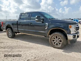 2021 Ford F-250 XL with VIN 1FT7W2BT6MEC47760, listed as a Copart auction lot 61908225 with 111,015 mi miles and Salvage title. Bid and sale history available at DreamBid. Image 4.