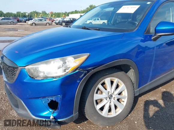 2014 Mazda CX-5 Sport z VIN JM3KE4BE7E0351982, wystawiony jako IAAI lot #42767499 z przebiegiem 154 774 mil mil oraz . Historia ofert i sprzedaży dostępna na DreamBid. Obrazek 6.
