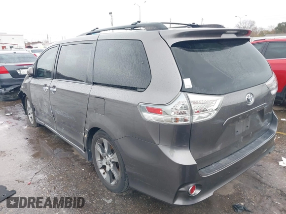 2014 Toyota Sienna SE with VIN 5TDXK3DC4ES434604, listed as a IAAI auction lot 41346434 with 108,633 mi miles and . Bid and sale history available at DreamBid. Image 3.