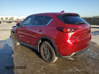 2021 Mazda CX-5 Touring with VIN JM3KFACM7M0393536, listed as a Copart auction lot 48488375 with 76,915 mi miles and Non Repairable. Bid and sale history available at DreamBid. Image 2.