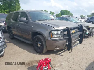 2012 Chevrolet Tahoe Commercial z VIN 1GNLC2E07CR187432, wystawiony jako IAAI lot #42126539 z przebiegiem 169 607 mil mil oraz . Historia ofert i sprzedaży dostępna na DreamBid. Obrazek 1.