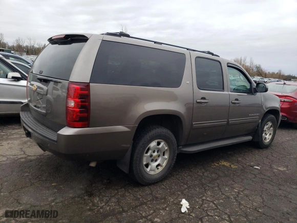 2013 Chevrolet Suburban LT with VIN 1GNSKJE7XDR101702, listed as a Copart auction lot 45577695 with 182,576 mi miles and Salvage Title. Bid and sale history available at carsss.com. Image 3.