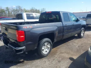 2015 Chevrolet Silverado 1500 LT with VIN 1GCVKREH4FZ256729, listed as a IAAI auction lot 41973711 with 185,791 mi miles. Bid and sale history available at carsss.com. Image 4.