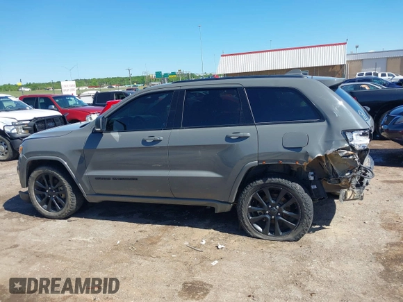 2019 Jeep Grand Cherokee Laredo E with VIN 1C4RJFAG8KC849782, listed as a IAAI auction lot 42151331 with 141,099 mi miles and . Bid and sale history available at DreamBid. Image 14.