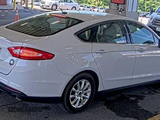 2015 Ford Fusion S with VIN 1FA6P0G7XF5127770, listed as a IAAI auction lot 42845978 with 150,942 mi miles and . Bid and sale history available at DreamBid. Image 6.
