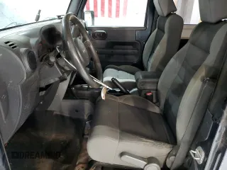 2007 Jeep Wrangler X with VIN 1J4FA24177L180229, listed as a Copart auction lot 52714705 with 170,516 mi miles and Salvage Title. Bid and sale history available at carsss.com. Image 7.