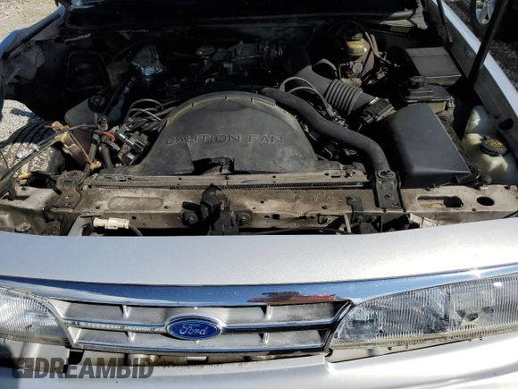 1997 Ford Crown Victoria z VIN 2FALP73W2VX179173, wystawiony jako Copart lot #57828405 z przebiegiem 251 598 mil mil oraz Szkoda całkowita • Salvage title. Historia ofert i sprzedaży dostępna na DreamBid. Obrazek 11.