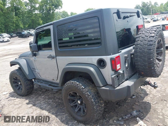 2016 Jeep Wrangler Black Bear with VIN 1C4AJWAG5GL258426, listed as a IAAI auction lot 42400914 with 128,606 mi miles and . Bid and sale history available at DreamBid. Image 3.