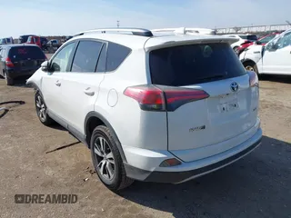 2018 Toyota RAV4 XLE with VIN JTMWFREV7JJ728184, listed as a IAAI auction lot 41377413 with 117,957 mi miles. Bid and sale history available at carsss.com. Image 3.