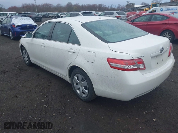 2011 Toyota Camry LE with VIN 4T4BF3EK3BR198945, listed as a IAAI auction lot 41879536 with 297,861 mi miles. Bid and sale history available at carsss.com. Image 3.