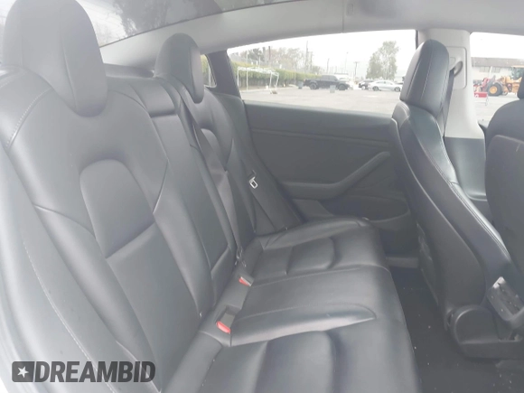 2020 Tesla Model 3 Long Range with VIN 5YJ3E1EB0LF803217, listed as a IAAI auction lot 41871940 with 130,391 mi miles. Bid and sale history available at carsss.com. Image 8.