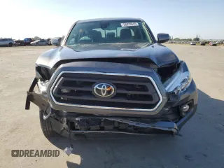 2020 Toyota Tacoma SR5 z VIN 3TMAZ5CN8LM126431, wystawiony jako Copart lot #56073545 z przebiegiem 27 612 mil mil oraz Szkoda całkowita • Salvage title. Historia ofert i sprzedaży dostępna na DreamBid. Obrazek 5.
