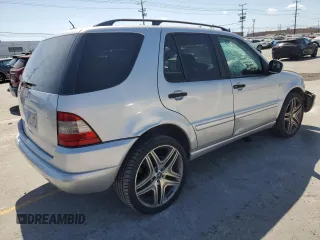 2001 Mercedes-Benz M 320/430/500 z VIN 4JGAB54E71A270139, wystawiony jako Copart lot #57175625 z przebiegiem 154 870 mil mil oraz Szkoda całkowita • Salvage title. Historia ofert i sprzedaży dostępna na DreamBid. Obrazek 3.