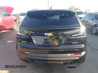 2019 Cadillac XT4 FWD Sport z VIN 1GYFZER43KF183181, wystawiony jako IAAI lot #41869141 z przebiegiem 25 539 mil mil oraz . Historia ofert i sprzedaży dostępna na DreamBid. Obrazek 16.