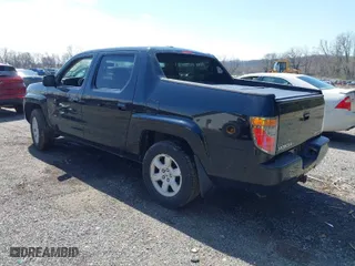 2007 Honda Ridgeline RTL w/Leather with VIN 2HJYK165X7H548322, listed as a IAAI auction lot 41983105 with 152,292 mi miles. Bid and sale history available at carsss.com. Image 3.