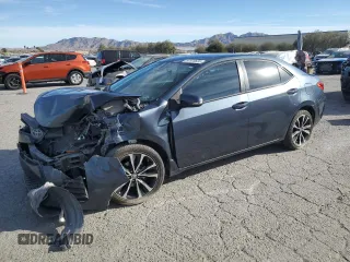 2019 Toyota Corolla L with VIN 2T1BURHE4KC184532, listed as a Copart auction lot 87870635 with 82,357 mi miles and Salvage Title. Bid and sale history available at DreamBid. Image 1.
