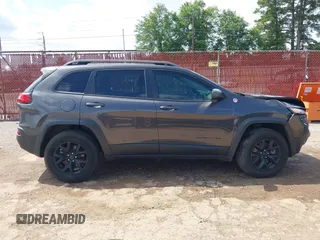 2014 Jeep Cherokee Trailhawk с VIN 1C4PJMBS6EW278648, выставлен на аукционе IAAI как лот 42433381 с пробегом 136 702 миль миль и . История ставок и продаж доступна на DreamBid. Изображение 13.