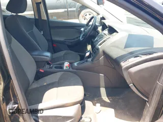 2014 Ford Focus SE with VIN 1FADP3F24EL431332, listed as a IAAI auction lot 42135538 with 121,362 mi miles. Bid and sale history available at carsss.com. Image 5.