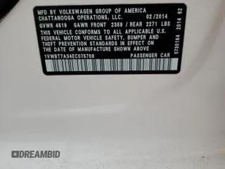 2014 Volkswagen Passat SE z VIN 1VWBT7A34EC075708, wystawiony jako Copart lot #57662405 z przebiegiem 78 077 mil mil oraz Szkoda całkowita • Salvage title. Historia ofert i sprzedaży dostępna na DreamBid. Obrazek 12.