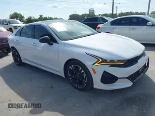 2022 Kia K5 GT-Line z VIN 5XXG64J24NG114772, wystawiony jako IAAI lot #42161747 z przebiegiem 60 761 mil mil oraz . Historia ofert i sprzedaży dostępna na DreamBid. Obrazek 1.