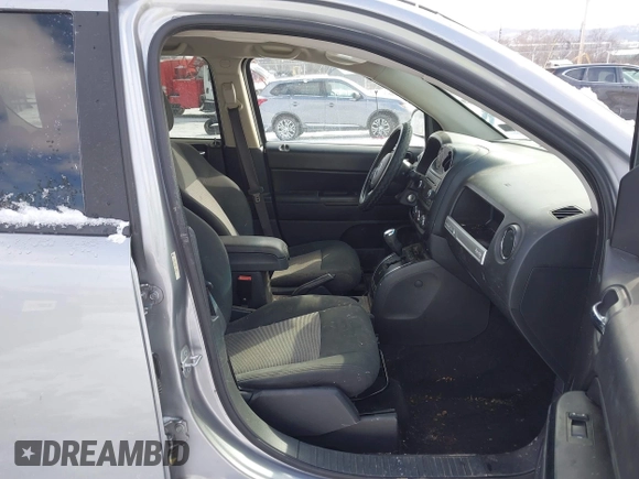 2015 Jeep Compass Sport with VIN 1C4NJDBB1FD206616, listed as a IAAI auction lot 41595052 with 112,836 mi miles. Bid and sale history available at carsss.com. Image 5.