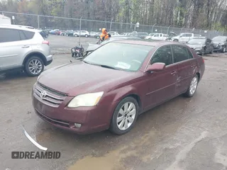 2006 Toyota Avalon XL with VIN 4T1BK36B86U159729, listed as a IAAI auction lot 41979414 with 160,874 mi miles. Bid and sale history available at carsss.com. Image 2.
