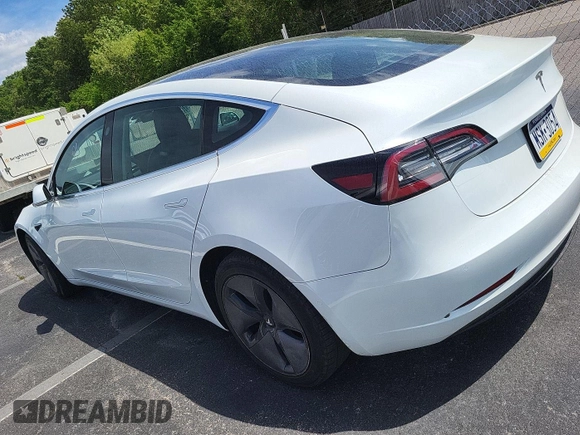 2020 Tesla Model 3 Long Range z VIN 5YJ3E1EB3LF646315, wystawiony jako IAAI lot #42398524 z przebiegiem 51 652 mil mil oraz . Historia ofert i sprzedaży dostępna na DreamBid. Obrazek 2.