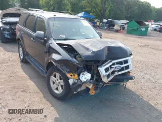 2011 Ford Escape Hybrid with VIN 1FMCU4K37BKA45651, listed as a IAAI auction lot 42441757 with 504,073 mi miles and . Bid and sale history available at DreamBid. Image 6.