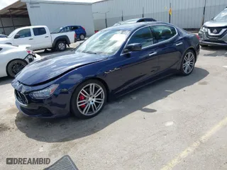 2015 Maserati Ghibli S Q4 with VIN ZAM57RTA2F1144111, listed as a IAAI auction lot 41916876 with 26,732 mi miles. Bid and sale history available at carsss.com. Image 2.