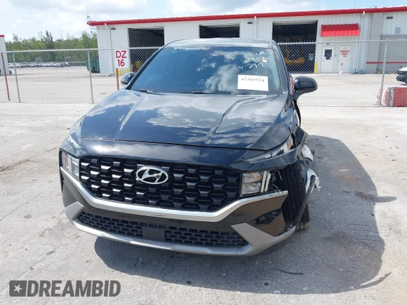 2021 Hyundai Santa Fe SE z VIN 5NMS14AJ0MH332918, wystawiony jako IAAI lot #42365534 z przebiegiem 58 720 mil mil oraz . Historia ofert i sprzedaży dostępna na DreamBid. Obrazek 6.