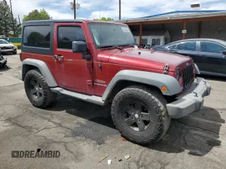 2012 Jeep Wrangler Sport with VIN 1C4AJWAG4CL278063, listed as a Copart auction lot 56313005 with 109,998 mi miles and Salvage title. Bid and sale history available at DreamBid. Image 4.