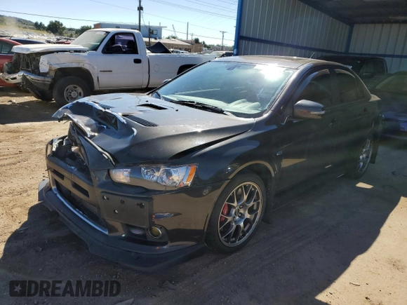 2015 Mitsubishi Lancer Evolution MR z VIN JA32W5FV5FU006111, wystawiony jako Copart lot #68985683 z przebiegiem 54 774 mil mil oraz . Historia ofert i sprzedaży dostępna na DreamBid. Obrazek 1.