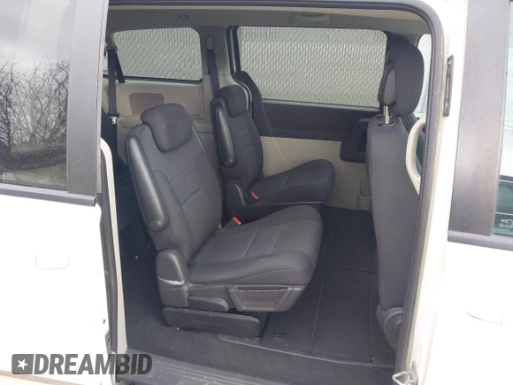 2010 Dodge Grand Caravan SXT with VIN 2D4RN5D17AR408112, listed as a IAAI auction lot 42128842 with 173,862 mi miles and . Bid and sale history available at DreamBid. Image 8.