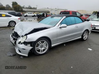 2004 Mercedes-Benz CLK 55 AMG with VIN WDBTK76G44T021103, listed as a Copart auction lot 84726784 with 77,565 mi miles and Salvage Title. Bid and sale history available at DreamBid. Image 1.