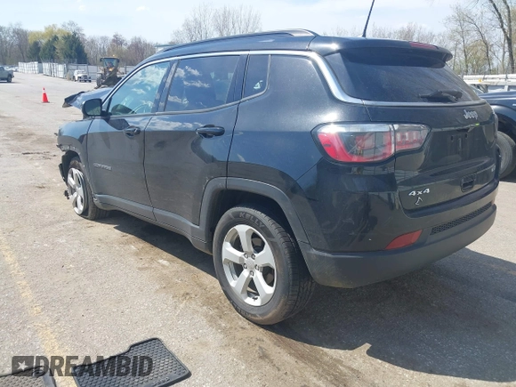 2018 Jeep Compass Latitude with VIN 3C4NJDBB1JT265894, listed as a IAAI auction lot 42109967 with 92,944 mi miles and . Bid and sale history available at DreamBid. Image 3.