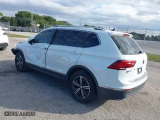 2019 Volkswagen Tiguan SE with VIN 3VV3B7AX9KM067418, listed as a IAAI auction lot 41434045 with 96,968 mi miles. Bid and sale history available at carsss.com. Image 3.