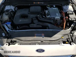 2016 Ford Fusion SE Hybrid с VIN 3FA6P0LU4GR259692, выставлен на аукционе Copart как лот 57100415 с пробегом 154 051 миль миль и Списание • Salvage title. История ставок и продаж доступна на DreamBid. Изображение 11.