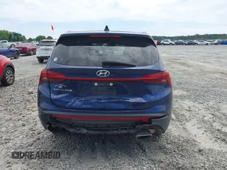 2021 Hyundai Santa Fe SE with VIN 5NMS14AJ2MH323542, listed as a IAAI auction lot 42182576 with 69,385 mi miles and . Bid and sale history available at DreamBid. Image 16.