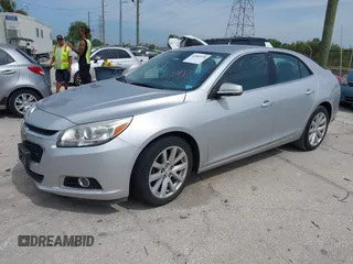 2014 Chevrolet Malibu LT with VIN 1G11E5SL6EF133840, listed as a IAAI auction lot 41885958 with 156,248 mi miles and . Bid and sale history available at DreamBid. Image 2.