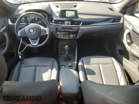 2018 BMW X1 sDrive28i with VIN WBXHU7C35J5L09783, listed as a Copart auction lot 55147935 with 37,114 mi miles and Salvage Title. Bid and sale history available at DreamBid. Image 8.