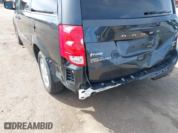 2011 Dodge Grand Caravan Crew with VIN 2D4RN5DG3BR660235, listed as a IAAI auction lot 41945522 with 148,924 mi miles and . Bid and sale history available at DreamBid. Image 6.