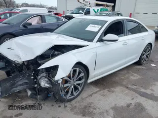 2014 Audi A6 Prestige z VIN WAUHMAFC6EN098487, wystawiony jako IAAI lot #41908034 z przebiegiem 146 298 mil mil oraz . Historia ofert i sprzedaży dostępna na DreamBid. Obrazek 2.